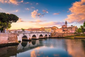 Rimini,Cityscape.,Tiberius,Bridge,Famous,Sightseeing,In,Rimini,At,Dawn.