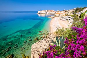 Dubrovnik.,Banje,Turquoise,Beach,And,Historic,City,Of,Dubrovnik,View,